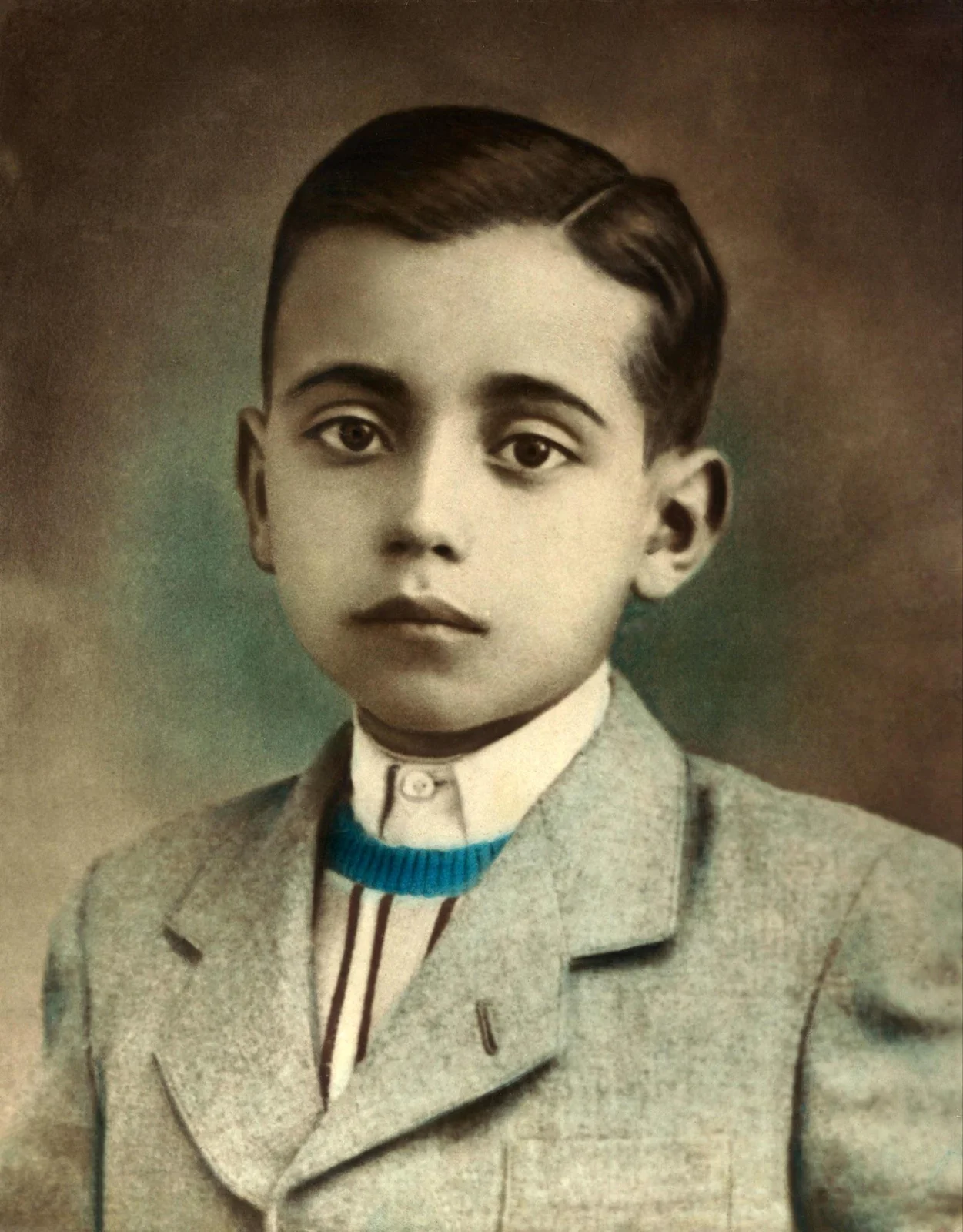 Hand-tinted studio portrait of Melehi as a boy