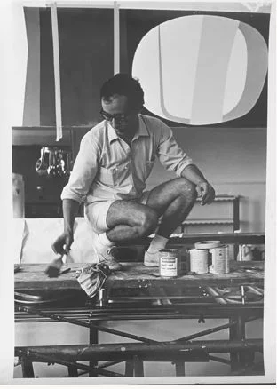 Melehi at work on a hard-edge canvas in the studio