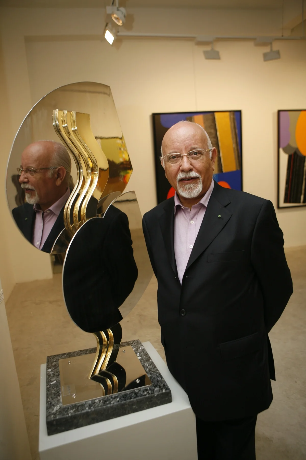 Melehi with his sculpture